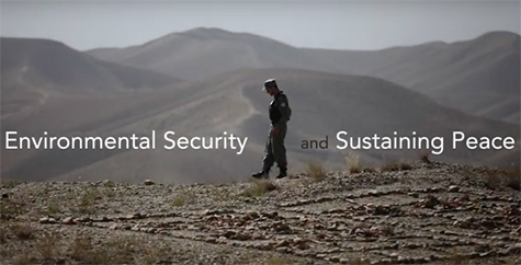 Photo of soldier with mountains in background and title of massive open online course, Envirmental Security and Sustaining Peace